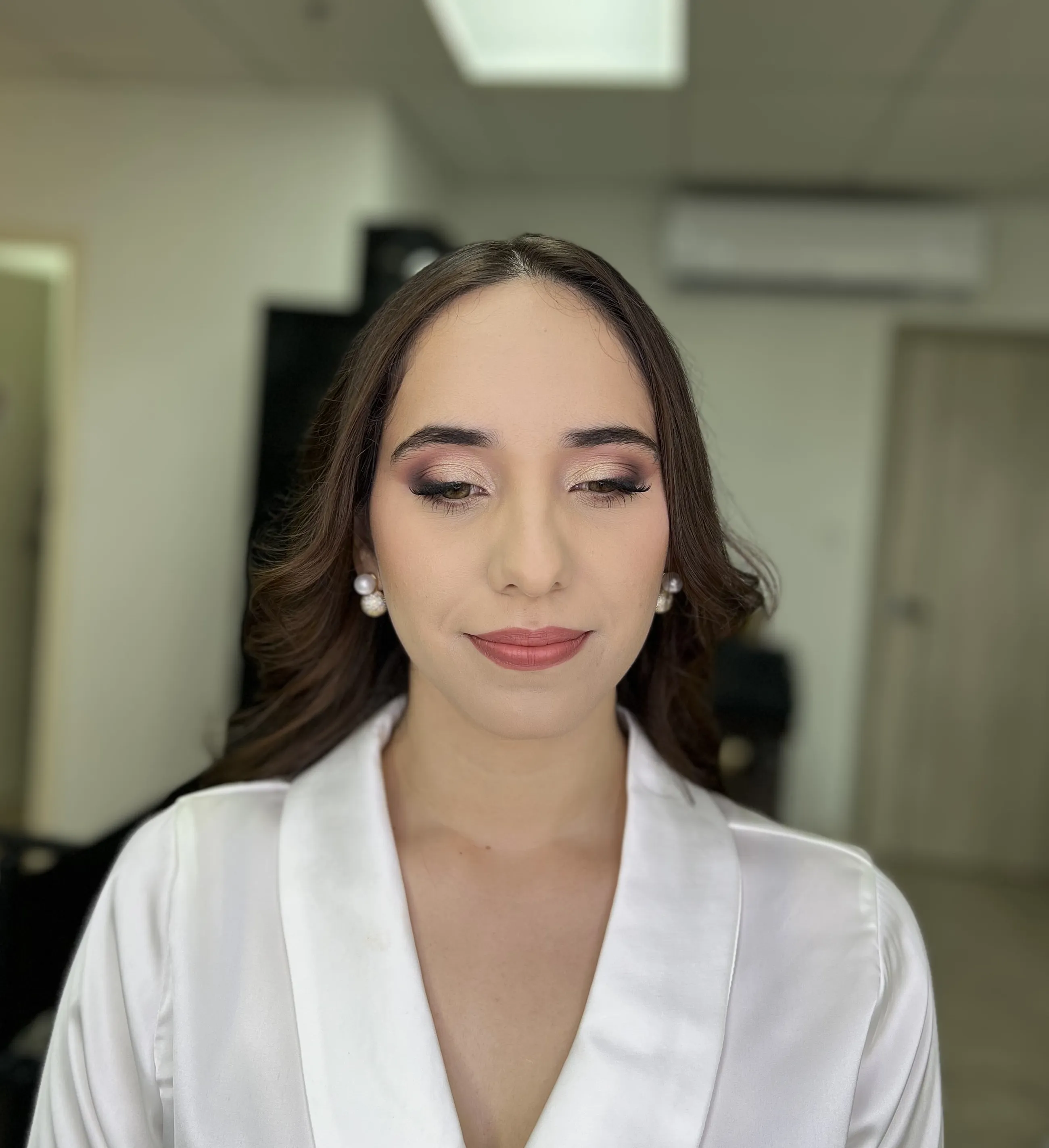 Wedding day bridal makeup close-up.